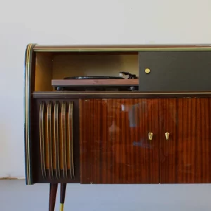 Vintage wooden cabinet with record player inside.