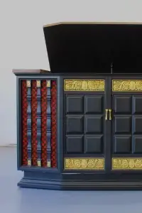 Eye-level front view of the "Angus" custom-painted GE Multiplex stereo console with refinished wood top and red speaker cloth.