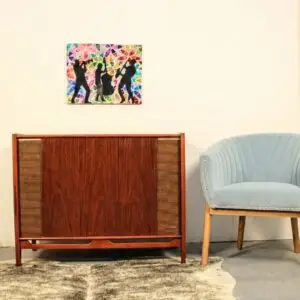 Restored Brubeck stereo console styled in a mid-century modern living room with vintage furniture.