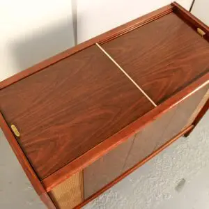 Closed view of a restored Magnavox Brubeck console featuring a hand-rubbed walnut finish.