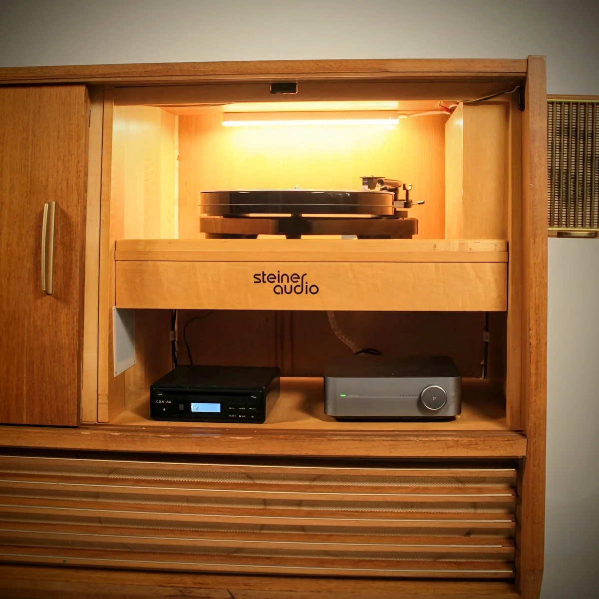 Technical view of WiiM high-res streaming and modern electronics inside "The Judge".